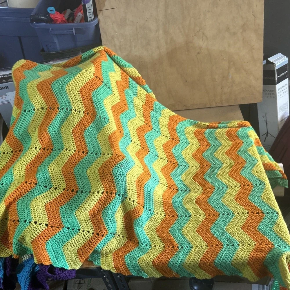 a vintage handmade crochet ripple or chevron pattern blanket 50
